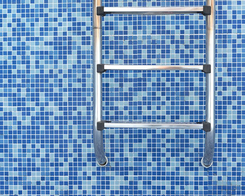How To Repair Loose Pool Tiles
